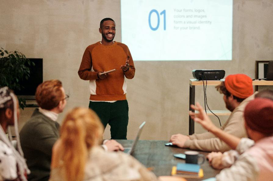 a man is giving presentation